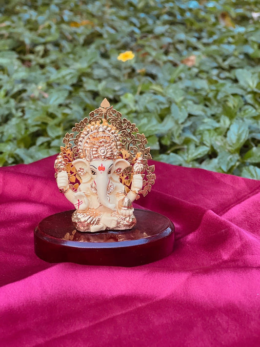 DESHANA Stylish Gold Plated Lord Ganesha with Wooden Base – A Divine Symbol of Prosperity and Elegance