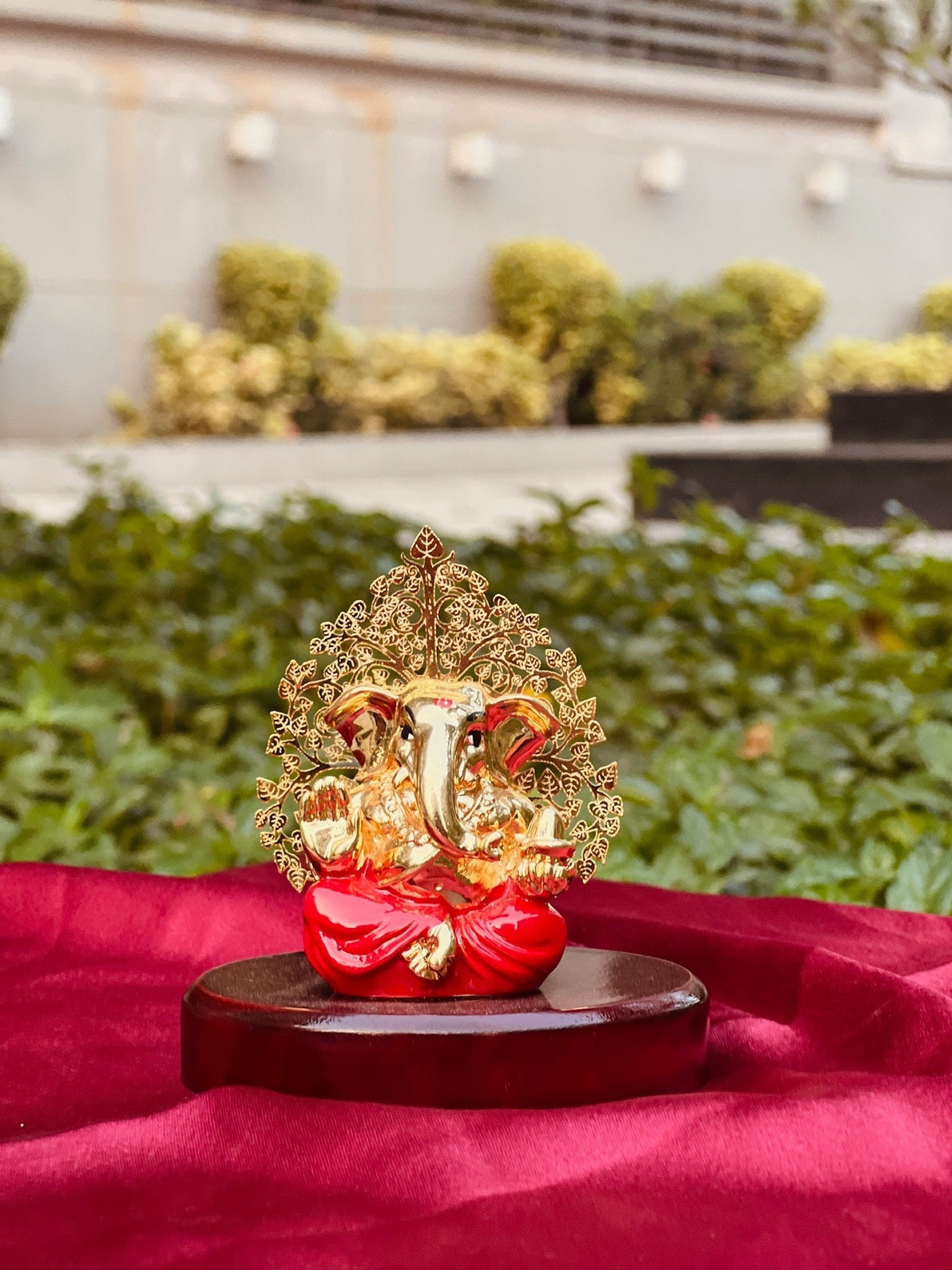 DESHANA Stylish Gold Plated Lord Ganesha with Wooden Base – A Divine Symbol of Prosperity and Elegance
